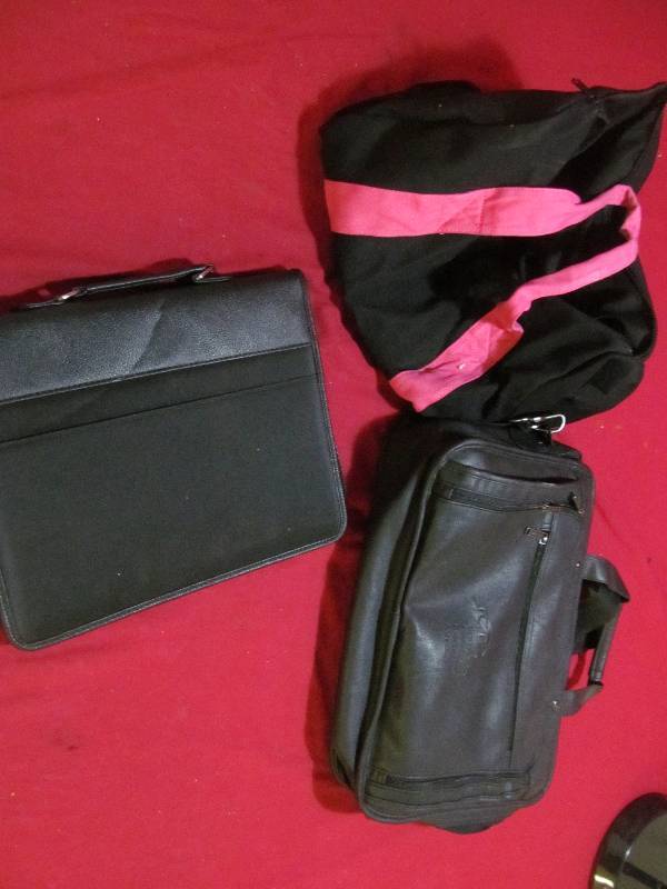 lot 31 image: duffle bags, binder