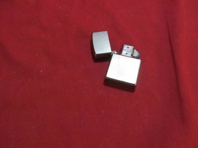 lot 34 image: Zippo lighter