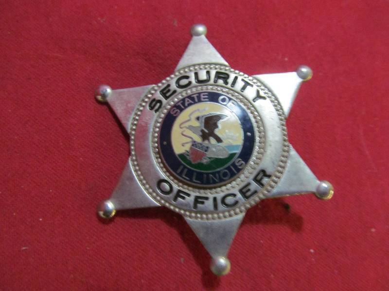 lot 54 image: Security officer star