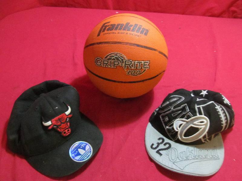 lot 83 image: basketball, caps