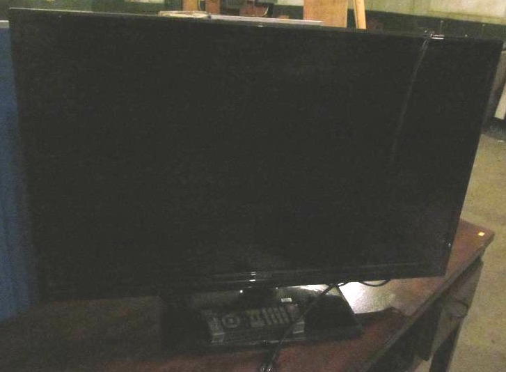 lot 163 image: Seiki flat screen TV