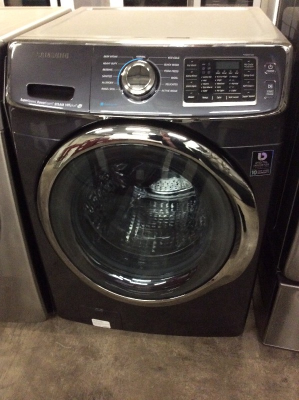 lot 29 image: Samsung Dark Gray Front Load Gas Dryer On Pedestal