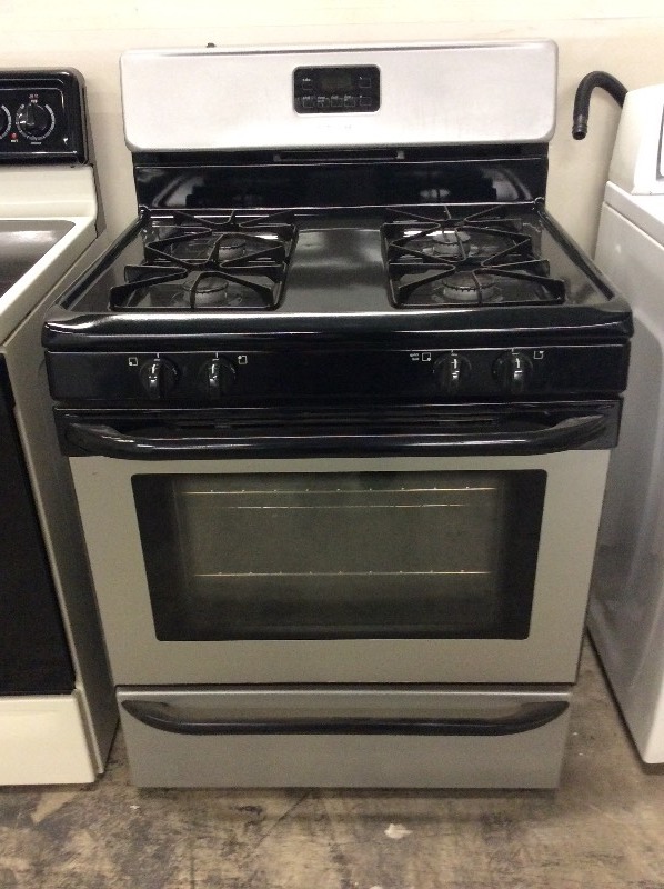 lot 7 image: Frigidaire Slate Colored Four Burner Gas Stove