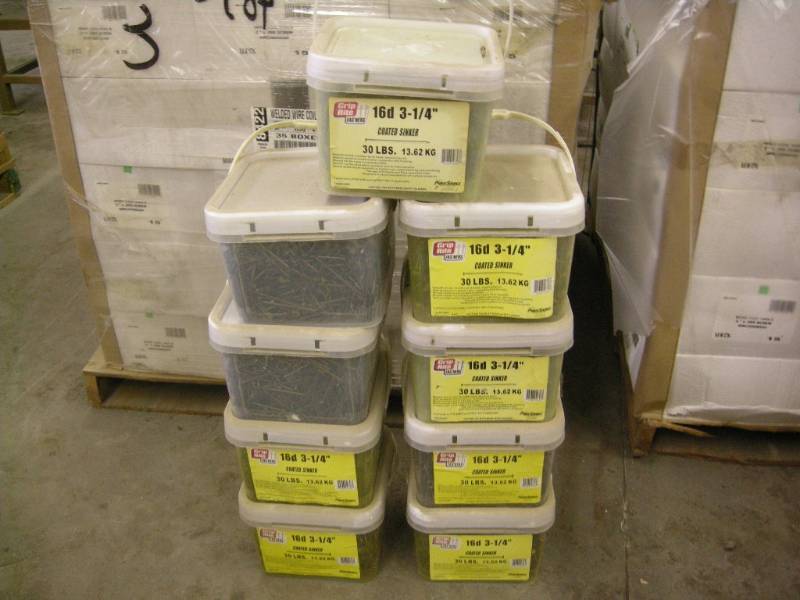 lot 215 image: 9 Tubs 16d 3-14 Coated Sinker Nails