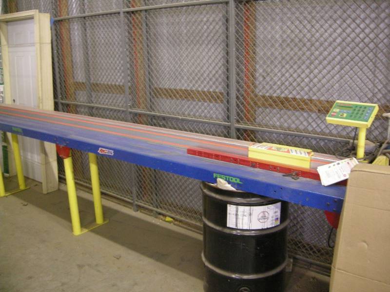 lot 1 image: Tigerstop Automated Material Pusher