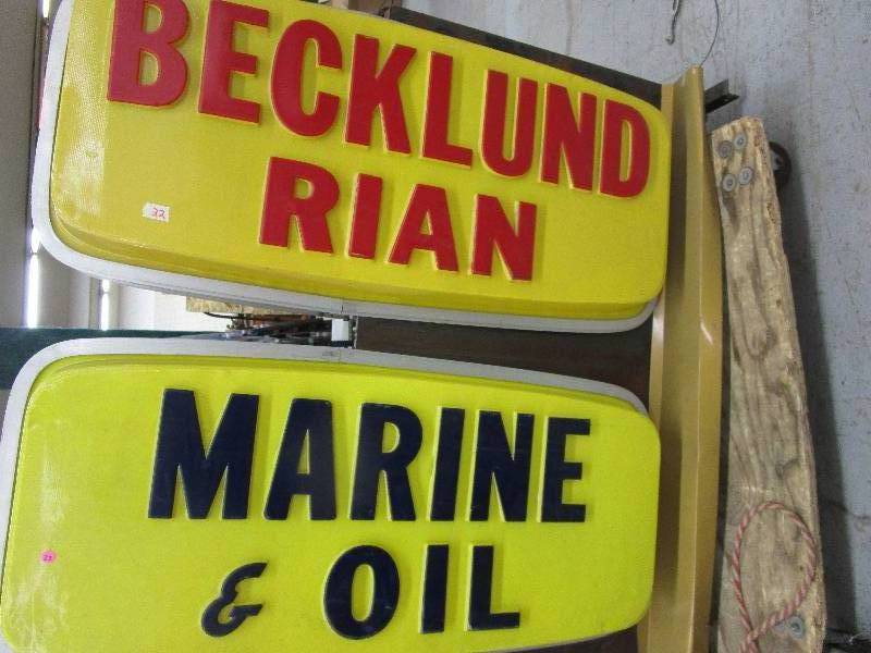 lot 22 image: Becklund Rain and Marine and Oil Signs (They are Two Sided) They are lighted but not tested
