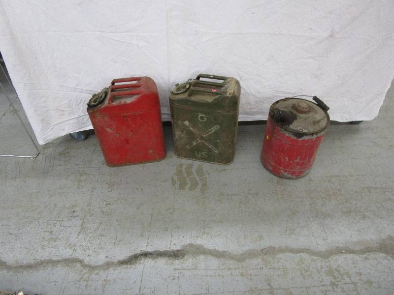 lot 55 image: Gas cans full of unknown