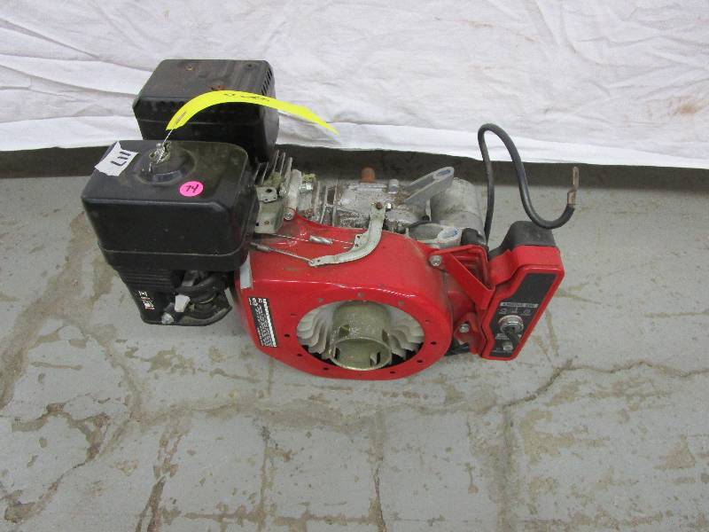 lot 74 image: Honda 5 HP Motor - Electric Start - Parts
