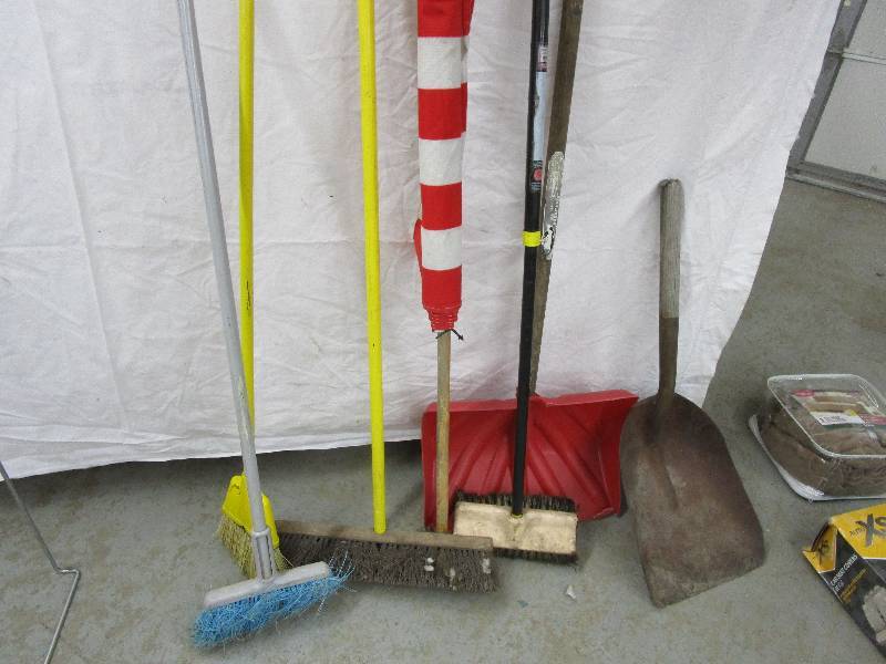 lot 118 image: Flag, Brooms & Shovels