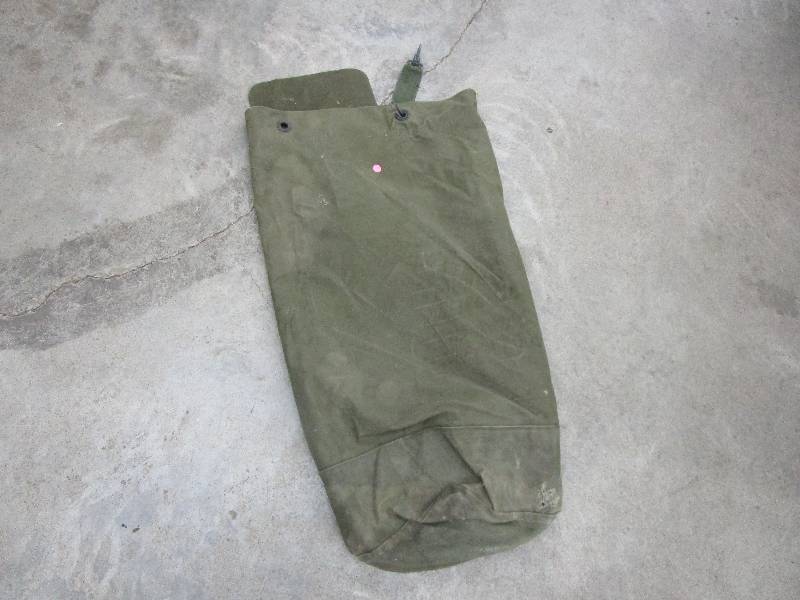 lot 134 image: US Military Bag says Anderson #a-7685 says San Diago, Long Beach, Sanfrancisco, Hawaii, Phillapines, Hong Kong  and Camp Lejuen Some Damage