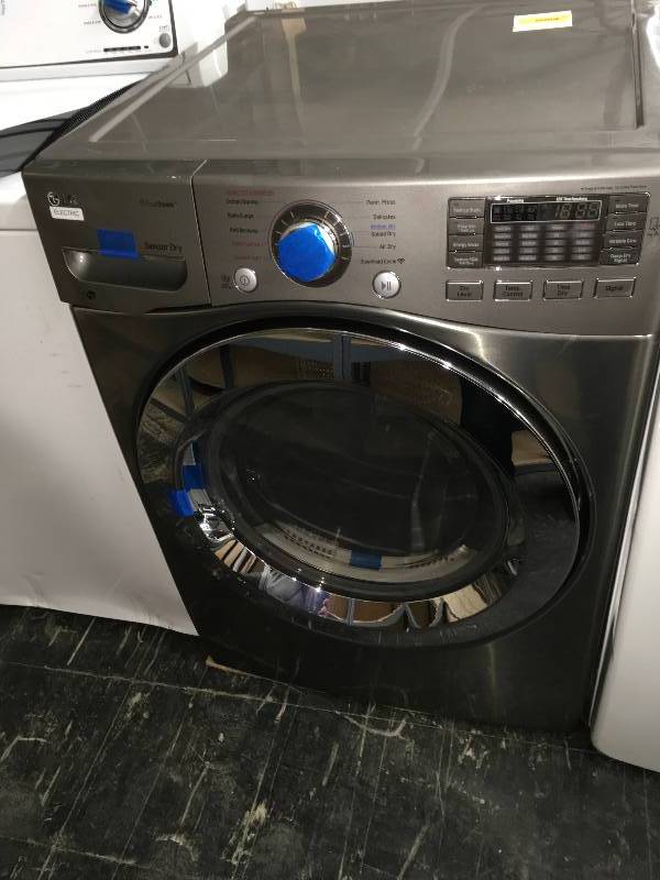 lot 594 image: LG 7.4 cu. ft. Ultra Large Capacity SteamDryer, $1,049.99