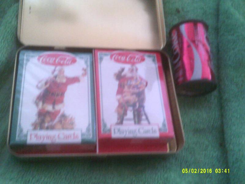 VINTAGE COCA COLA TIN WITH THE CARDS STILL IN IT AND COKE PENCIL SHARPENER