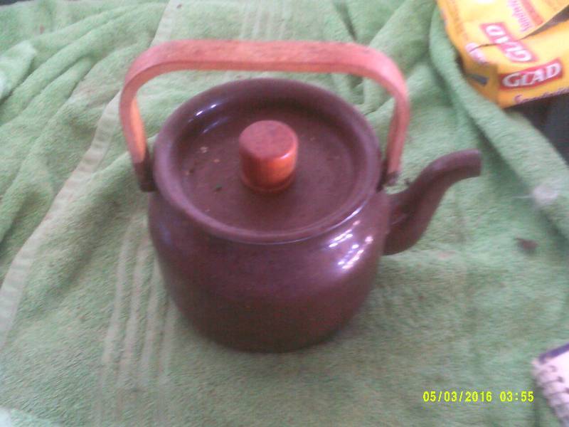 ANTIQUE METAL TEAPOT
