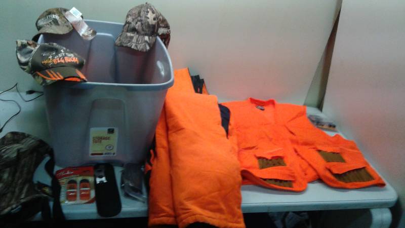 Bin Filled With Hunting Items, Clothing, Overalls Show Wear