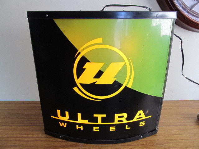 lot 43 image: Working ULTRA WHEELS Rollerblades Lighted Advertising Sign