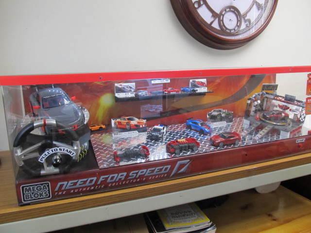 lot 76 image: MEGA BLOKS Need For Speed Race Car Store Display - WORKS