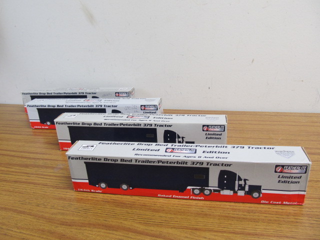lot 93 image: 3 NIB Diecast Metal Limited Edition Advertising Semi Trucks
