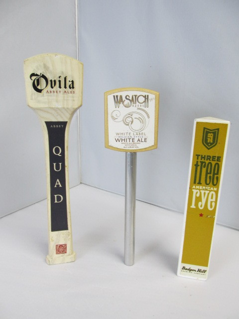 lot 25 image: 3 Assorted Beer Tap Handles - WASATCH, Three Tree, & Ovila Abbey Ale