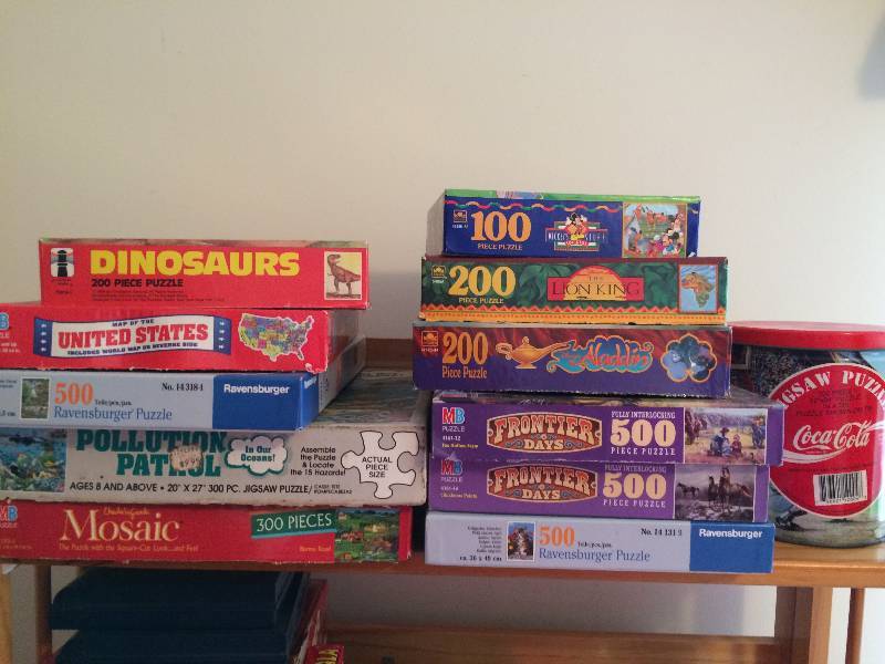 ASSORTED PUZZLES LIKE NEW CONDITION