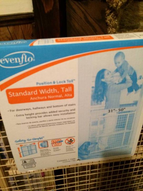 lot 112 image: TWO NEW IN BOX BABY DOGGIE GATES