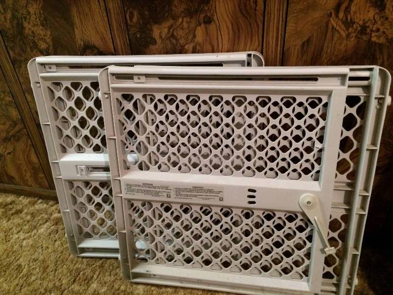 lot 113 image: TWO USED DOGGIE BABY GATES