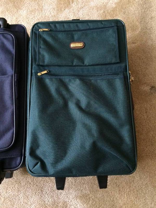 lot 66 image: EXCELLENT CONDITION WITH KEYS AMERICAN TOURISTER ROLLING LUGGAGE