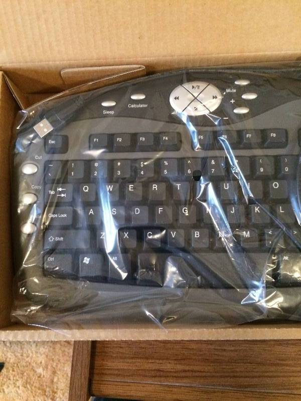 lot 14 image: eMACHINE KEYBOARD - NEW IN BOX