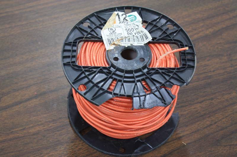 lot 21 image: Spool of Orange 12AWG 500ft Wire