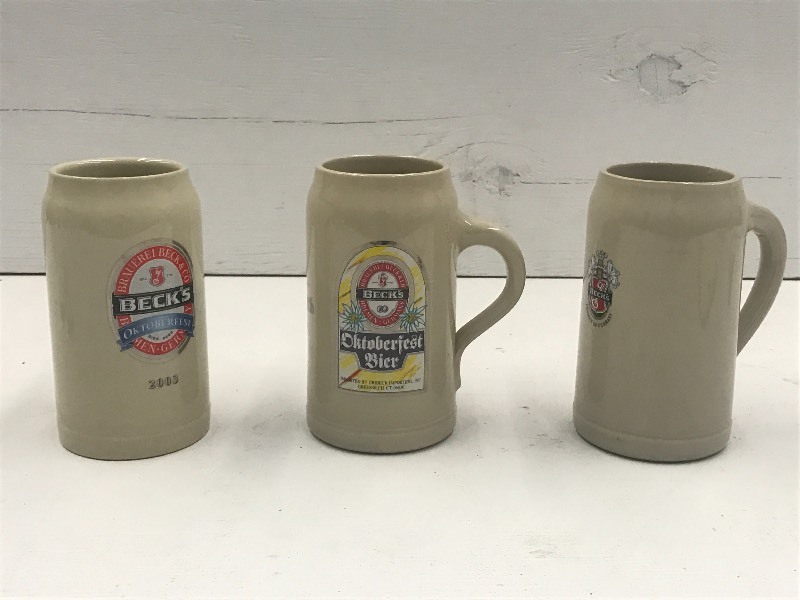 lot 40 image: Lot Of (3) Becks Beer Mugs, 7.5 He...