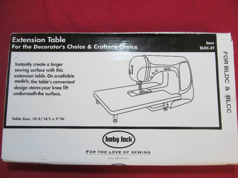 lot 19 image: Baby Lock extension table