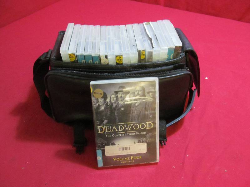 lot 23 image: Deadwood series movies, leather case