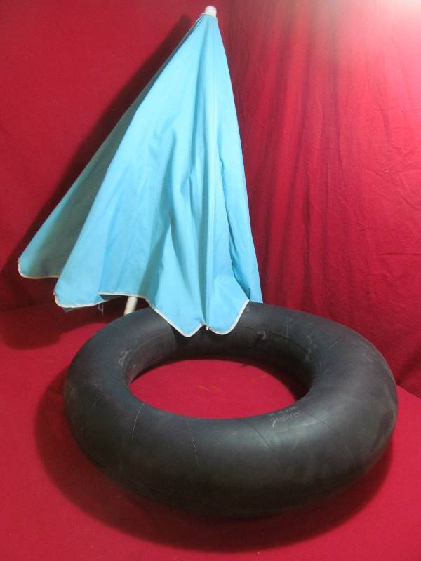 lot 47 image: umbrella, inner tube