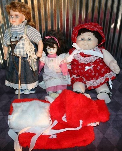 lot 96 image: Cabbage Patch Doll And Porcelain Dolls