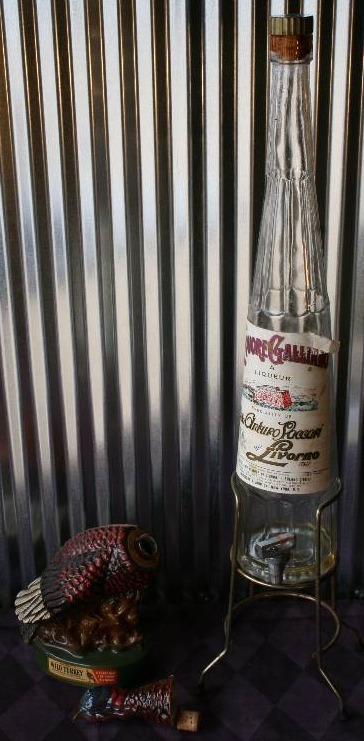 lot 128 image: Wild Turkey Decanter and Liquore Galliano Bottle