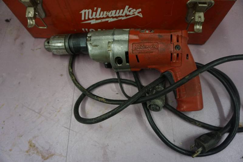 lot 22 image: Milwaukee Magnum Hammer Drill With Bits and Case