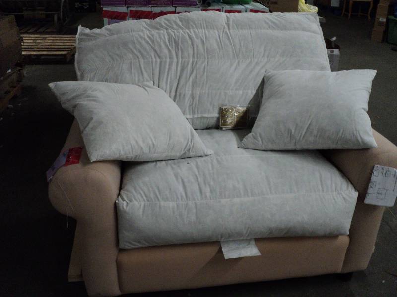 Chair from JC Penneys, comfortable down filled cushions, sturdy construction.  Brand New, slip cover not included, make your own or order online.