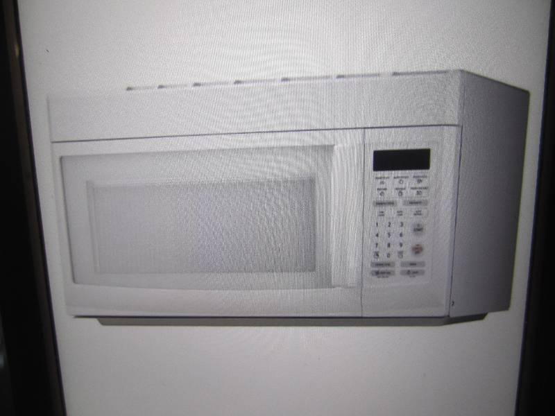 lot 382 image: Magic Chef 1.6 Cu Ft Over the Range...
