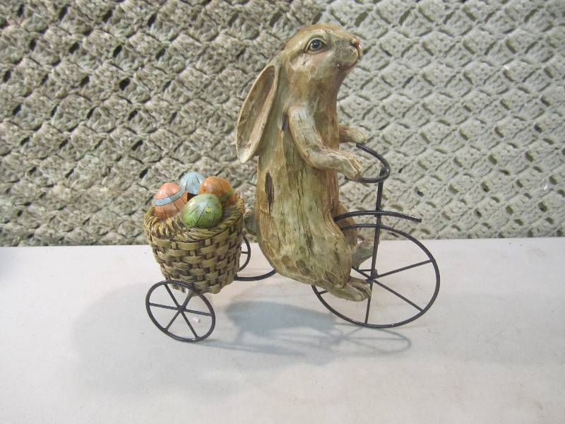 lot 323 image: Rabbit Figure on Metal Wire Bike 9....