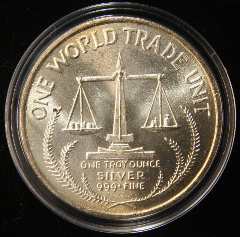 1 TROY OZ. .999 FINE SILVER WORLD TRADE UNIT IN AIRTITE