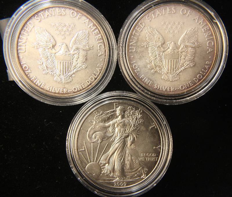 GROUP OF 3 SILVER AMERICAN EAGLES COLOR ENHANCED IN AIRTITE
