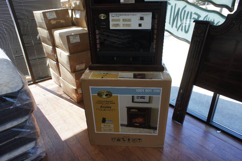 lot 32 image: New, in box Ansley 32 in. Rolling Mantel Infrared Electric Fireplace in Cherry