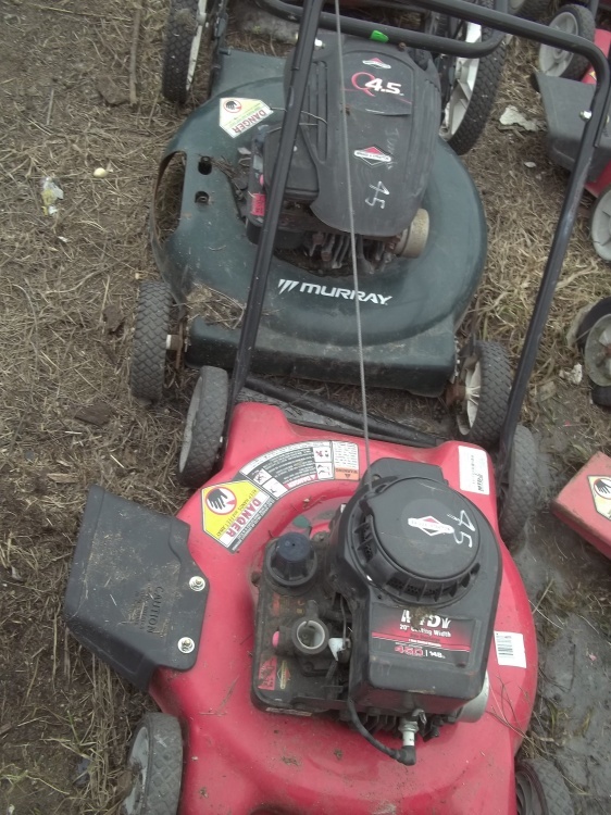 lot 145 image: Push mowers for parts and repair Yard Machines Red and Murray Green