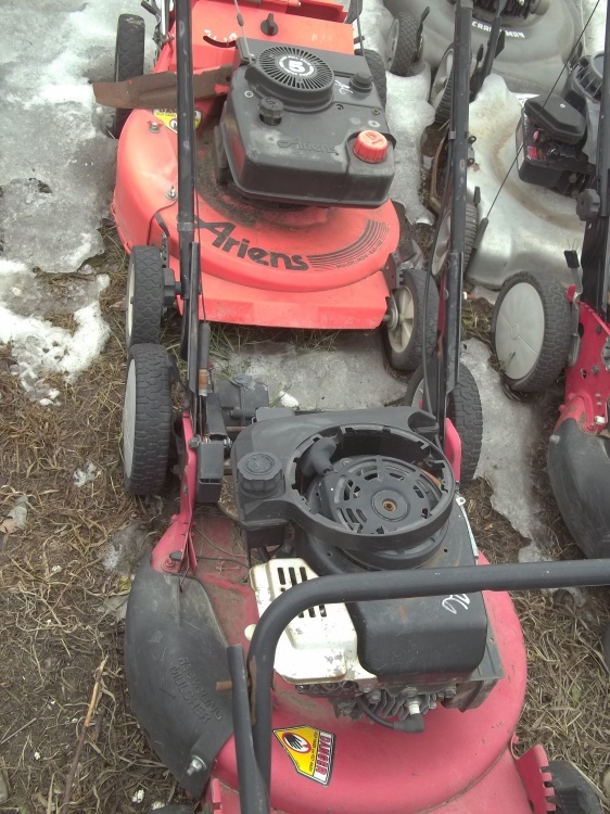 lot 146 image: Push mowers for parts and repair Snapper and Ariens