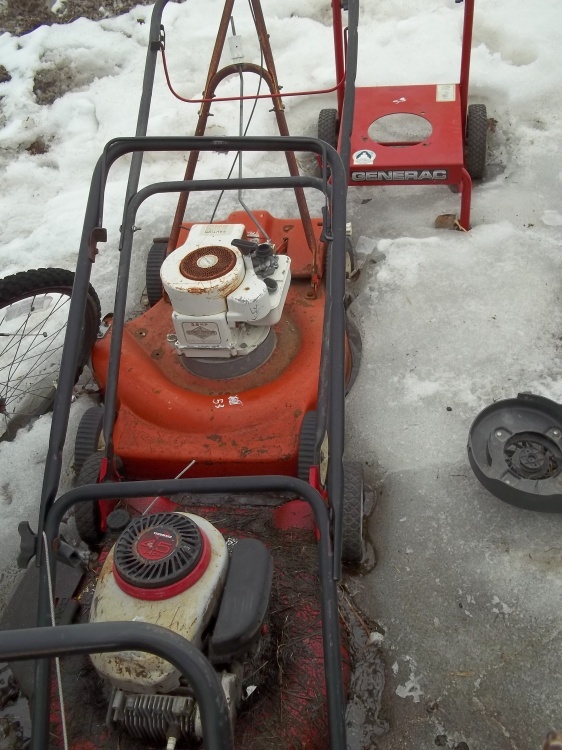 lot 153 image: Pair of push mower for parts and repair murray and Orange mower with pressure washer frame