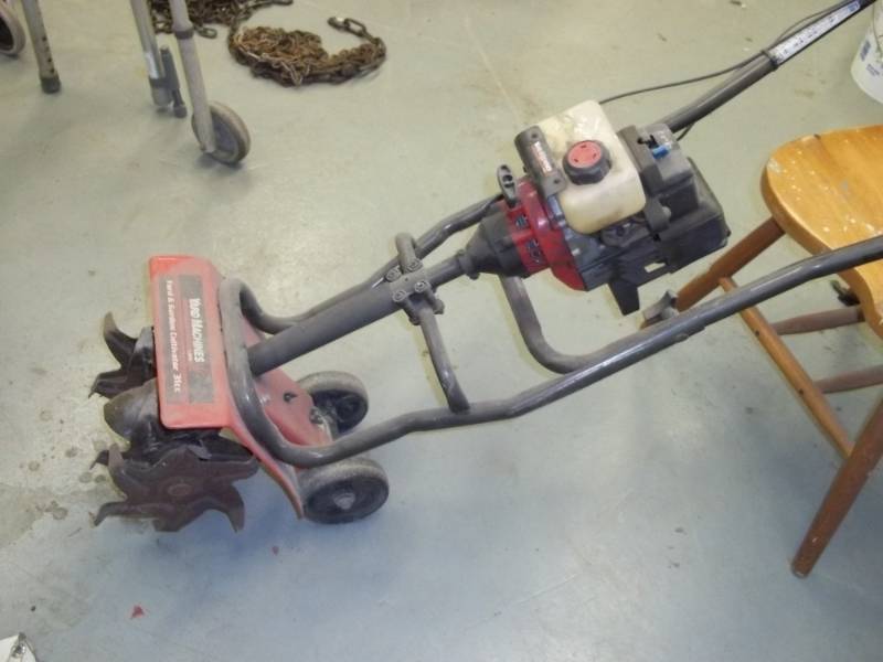 lot 64 image: Yard Machines Cultivator 31cc Consignor states runs