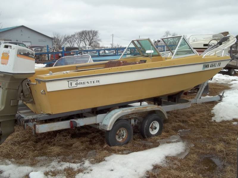 lot 4 image: 1975 Forester boat and trailer with 70 HP outboard motor