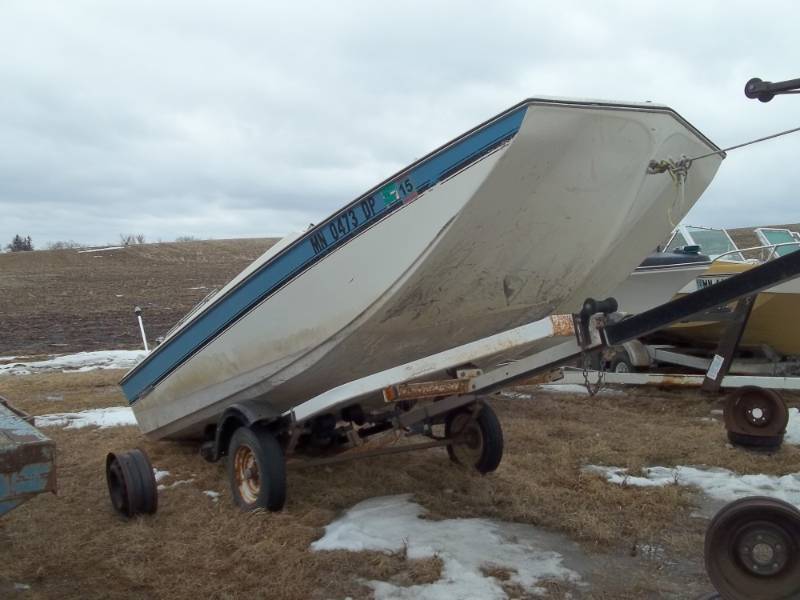 lot 6 image: 1976 Forester boat and trailer with 50 HP Mercury Outboard