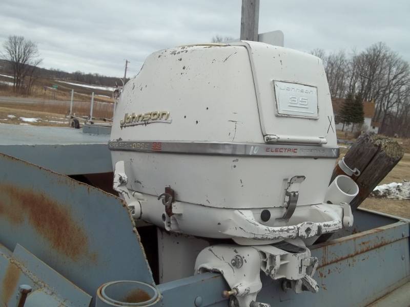 lot 10 image: Johnson 35 HP Boat Motor for parts or repair