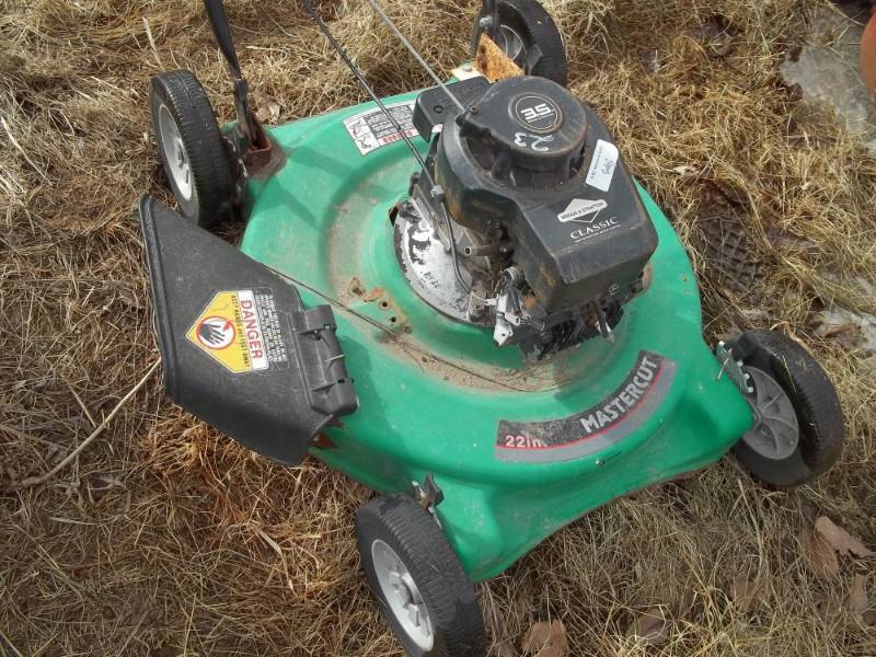 lot 23 image: Three Push Mowers for parts or repair, Master cut and Red mowers