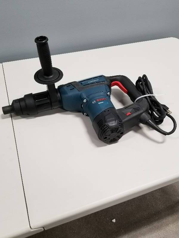 lot 11 image: Bosch 12 Amp Corded 1-916 in. Spline Combination Variable Speed Rotary Hammer with Auxiliary Handle